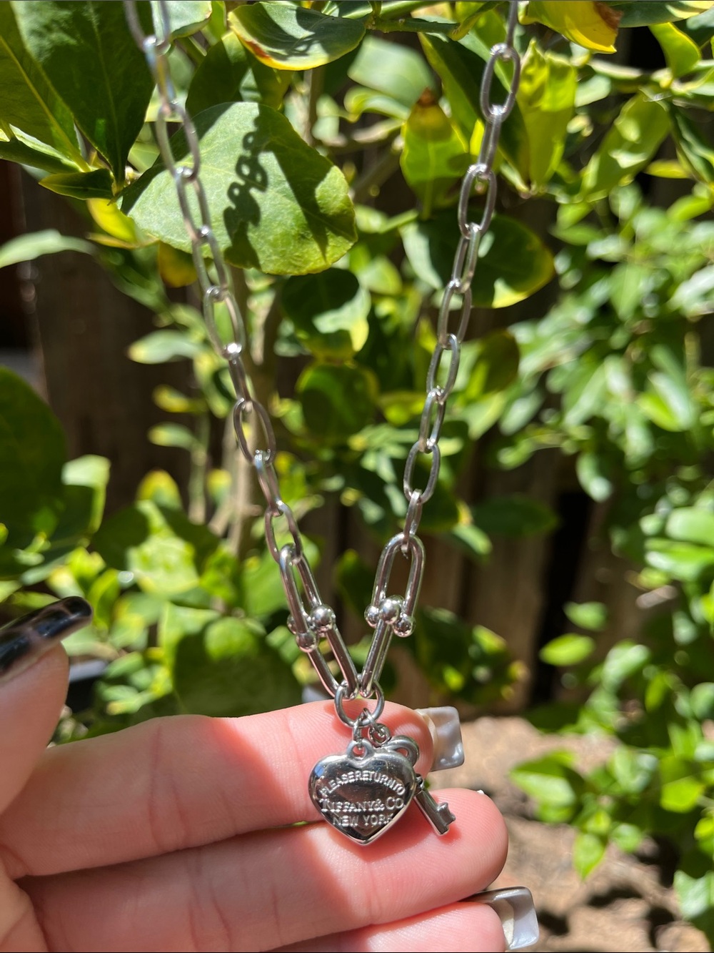 Tiffany & Co. Silver Heart Tag Necklace with Key Charm